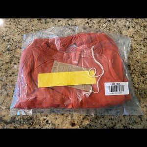 Kyte Baby zippered footie in clementine